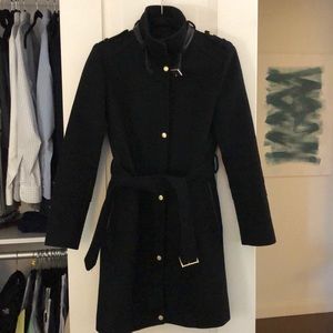 Black Cole Haan belted coat with leather trim